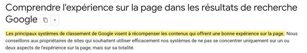 Documentation Google Search Central « Comprendre l'expérience sur la page », avec la phrase sur les systèmes de classement qui récompensent une bonne expérience surlignée en jaune